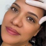 Customized Ombré powder brows on a dark-haired client.